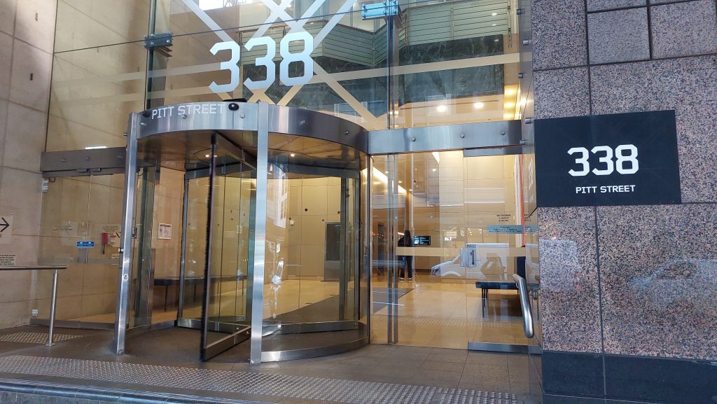 Building Exterior Entrance. Once you enter the building, use the lifts on the left side to go to Level 1.